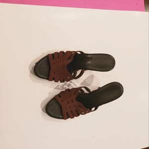 Female brown Cole Haan shoes.